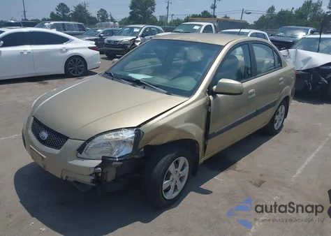 2009 Kia Rio Lx from USA, damaged, VIN KNADE223296477011